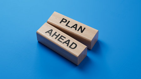 Plan ahead symbol. wooden blocks with words Plan ahead. Business and Plan ahead concept. wooden blocks. Copy space.3D rendering on blue background.の写真素材