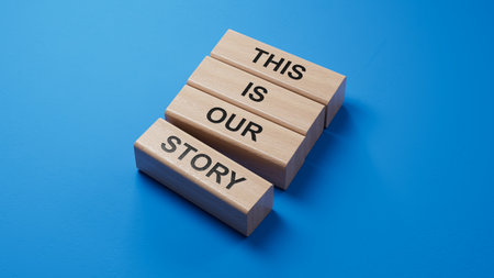 This is our Story symbol. wooden blocks with words This is our Story.Business and This is our Story concept. Copy space.3D rendering on blue background.の写真素材