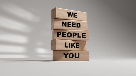 Hiring symbol. wooden blocks with words We need People like You.Business and Hiring concept. Copy space.3D rendering on white background.の写真素材