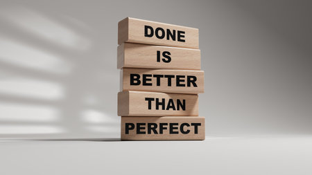 Done is better than Perfect symbol. wooden blocks with words Done is better than Perfect.Business...