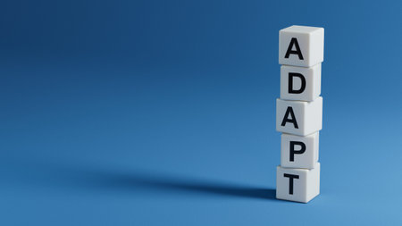 Adapt symbol. The concept word 'adapt' on wooden elements. Business, adaptation and adapt...