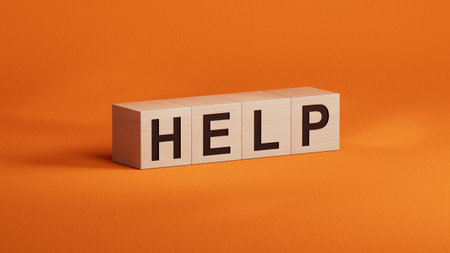 wooden cubes spelling.Flat lay view from above on wooden cubes buttons.IT technology concept.3D rendering on orange background.の写真素材