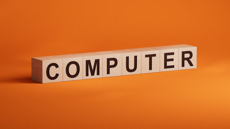 computer.wooden cubes spelling.Flat lay view from above on wooden cubes buttons.IT technology...