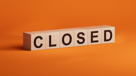 Closed - word concept. Minimalist Abstract Design. close up of wooden cubes,Business Concept. 3D rendering on orange background.の写真素材