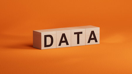 data.wooden cubes spelling.Flat lay view from above on wooden cubes buttons.IT technology concept.3D rendering on orange background.の写真素材