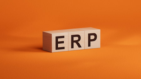 wooden cubes with erp text. Financial, marketing.close up of wooden cubes,Business Concept.3D rendering on orange background.の写真素材