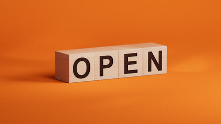 Open.wooden cubes spelling.Flat lay view from above on orange background with wooden cubes buttons.IT technology concept.3D rendering on orange background.の写真素材