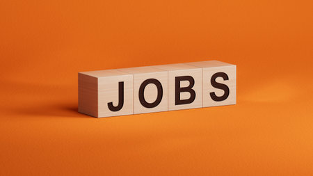 wooden cubes with JOBS business word.close up of wooden cubes,Business Concept.3D rendering on orange background.の写真素材