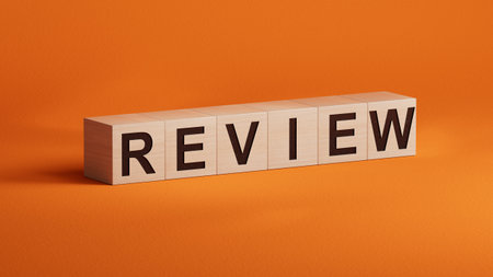 Review.3D illustration of wooden cubes.close up of wooden cubes,3D rendering on orange background.の写真素材