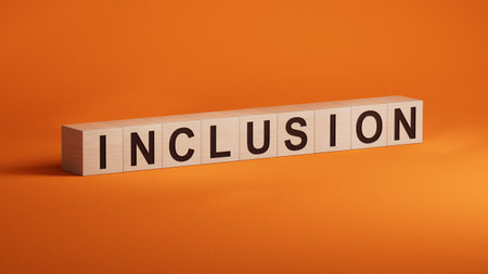 Symbol for a better inclusion. wooden cubes with word 'inclusion'. Beautiful orange background. Copy space.3D rendering on orange background.の写真素材