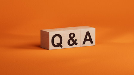 The wooden cubes form the word QA. The concept of QA is applied in various fields of human activity....