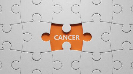 Text CANCER on The white puzzle pieces with missing pieces. Square wood blocks. Top view, flat lay.close up of The white puzzle pieces with missing pieces,Business Concept.3D rendering on orange background.の写真素材