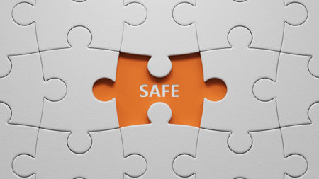 The white puzzle pieces with missing pieces with SAFE business word.close up of The white puzzle pieces with missing pieces,Business Concept.3D rendering on orange background.の写真素材