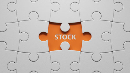 The white puzzle pieces with missing pieces with STOCK business word.close up of The white puzzle pieces with missing pieces,Business Concept.3D rendering on orange background.の写真素材