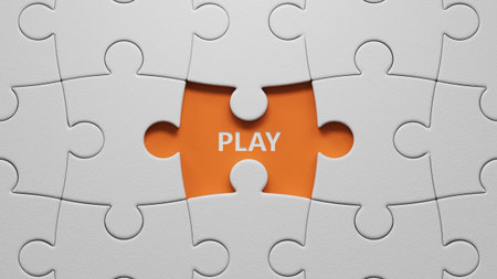 Play - word concept. Minimalist Abstract Design. close up of The white puzzle pieces with missing pieces. 3D rendering on orange background.の写真素材