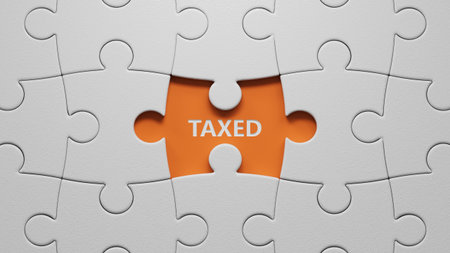 The white puzzle pieces with missing pieces with TAXED business word.close up of The white puzzle pieces with missing pieces,Business Concept.3D rendering on orange background.の写真素材
