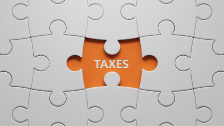 The white puzzle pieces with missing pieces with TAXES business word.close up of The white puzzle pieces with missing pieces,Business Concept.3D rendering on orange background.の写真素材
