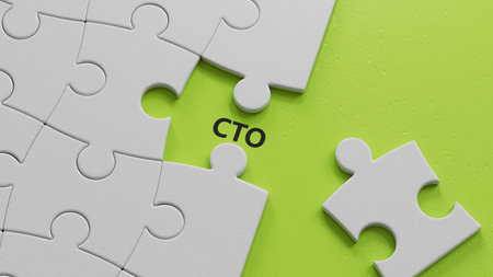 word cto with The white puzzle pieces with missing pieces.close up of The white puzzle pieces with missing pieces,Business Concept.3D rendering on green background.の写真素材