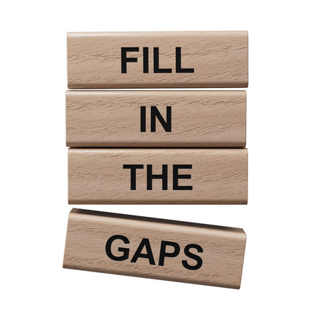 Fill in the gaps symbol. Concept words fill in the gaps on wooden blocks. Business and fill in the...