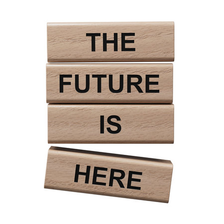 The future is here symbol. Concept words The future is here on wooden blocks.Business and The future is here concept. Copy space.Supports PNG files with transparent backgrounds.の写真素材