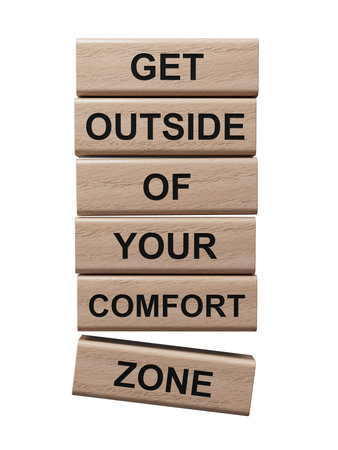 Get outside of your comfort zone symbol. Concept words Get outside of your comfort zone on wooden...