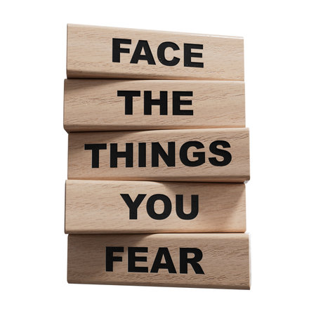 Face the things you fear symbol. wooden blocks with words Face the things you fear.Business and Face the things you fear concept.Supports PNG files with transparent backgrounds.の写真素材