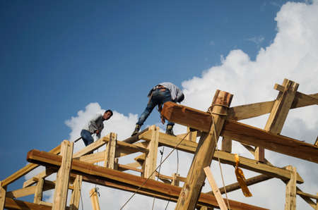 workers on the under construction buildingのeditorial素材