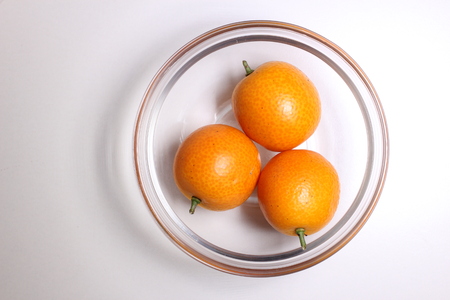 Kumquat fruit glass bowlの写真素材