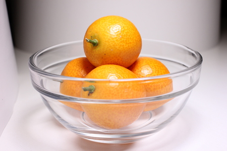 Kumquat fruit glass bowlの写真素材