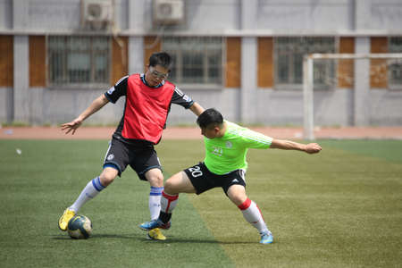 Men playing soccerのeditorial素材