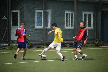 Men playing soccer
