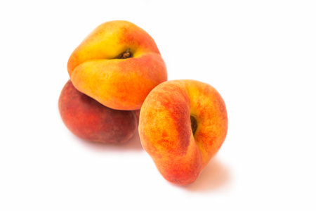 Ripe peach fruit isolated on white background.の写真素材