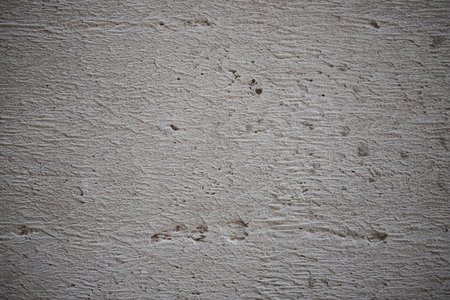 Space for text. Concrete light gray background. Abstract urban texture.
