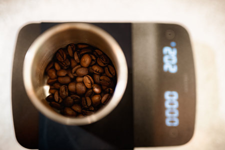 Coffee beans in a coffee machine. Selective focus.