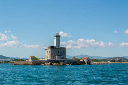 A beautiful lighthouse in the middle of seaの写真素材