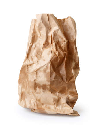 Crumpled paper bag with grease spots isolated on whiteの写真素材