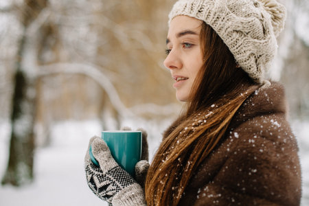 Portrait of young girl with coffee Winter Christmas New year time