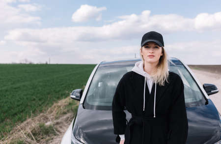 beautiful woman traveling by carの写真素材