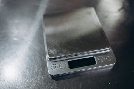 Digital kitchen scales on gray background. copy spaceの写真素材