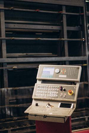 Factory for aluminum and PVC windows and doors production. Details industrial equipment. backgroundの写真素材