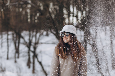 beautiful smiling young woman in winter outdoor. winter concept.の写真素材