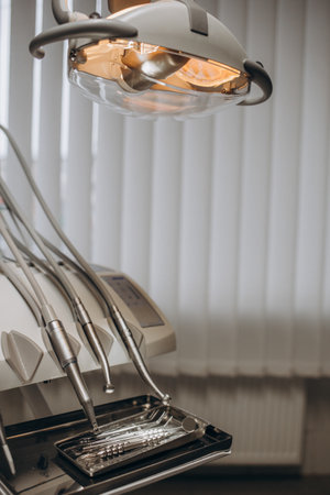 Close-up of a dentist's chair, with all the instruments ready to do a check-up. dental healthの写真素材