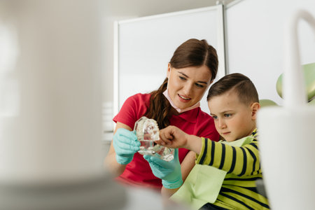 Shot of a little boy with dentists in a dental surgery. healthcare, medicine.の写真素材