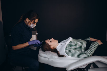 Diagnostic complex for microscopic examination of hair and skin of the scalp.Trichoscopic examination of hair, scalp and hair folliclesの写真素材