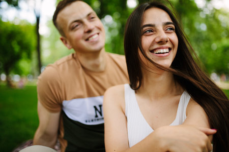 Young couple having picnic in countrysideの写真素材