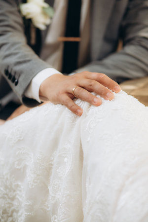Bride and groom holding hands. High quality photoの写真素材