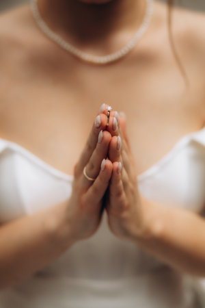 Wedding Rings Between Fingers on life. High quality photoの写真素材