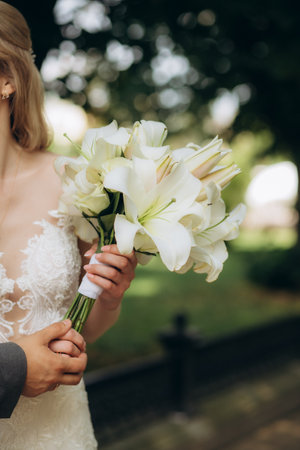 Wedding bouquet in bride's hands. beautiful wedding flowers. . High quality photoの写真素材