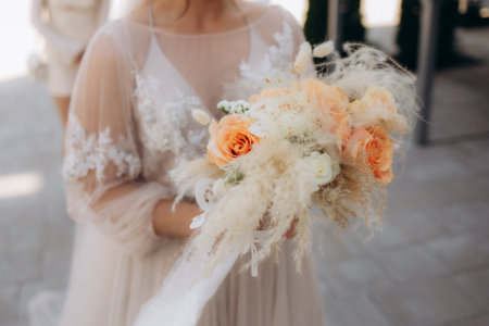bride holding gentle wedding bouquet. High quality photoの写真素材