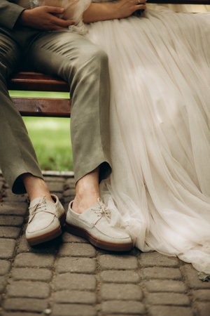 Feet in footwear of the groom and the bride . High quality photoの写真素材